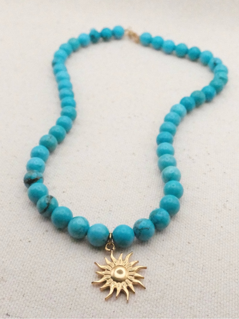 Beaded Turquoise Necklace with Sun Charm Sunburst